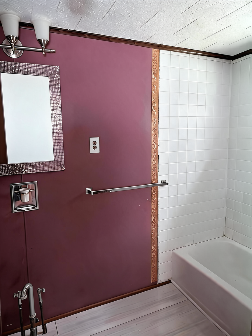 Bathroom with burgundy walls and tiled tub surround